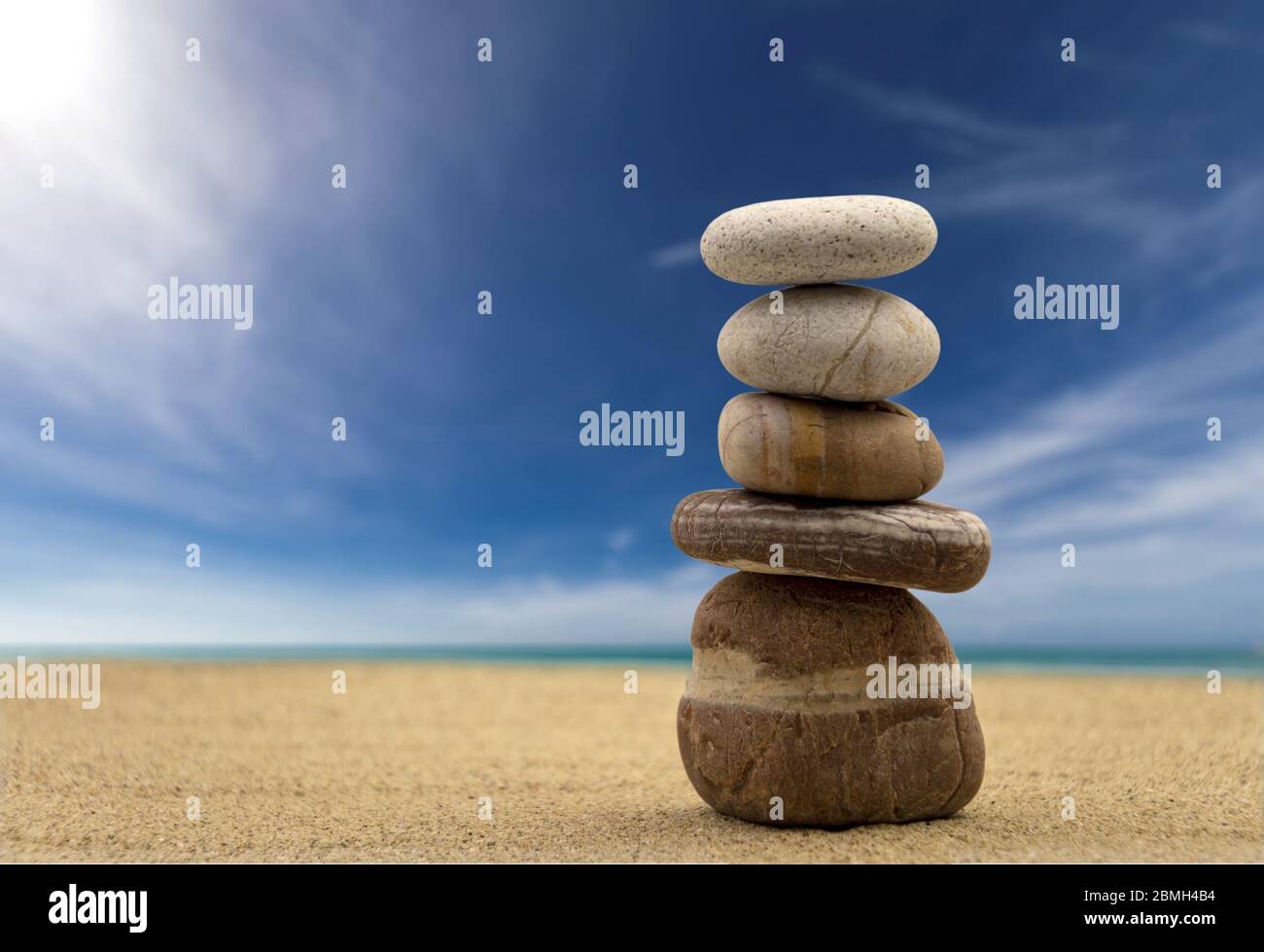 Zen stones balanced on the beach Stock Photo