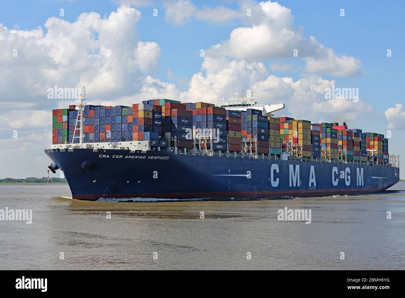 large containership amerigo vespucci on the way to Hamburg harbour Stock Photo