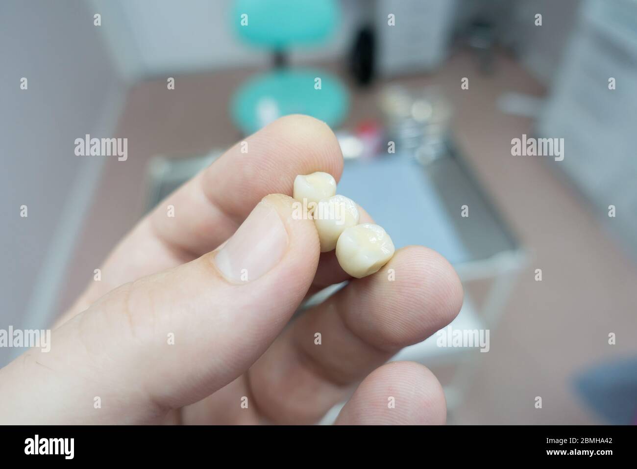 dental ceramic metal bridges in the hands of a doctor Stock Photo Alamy
