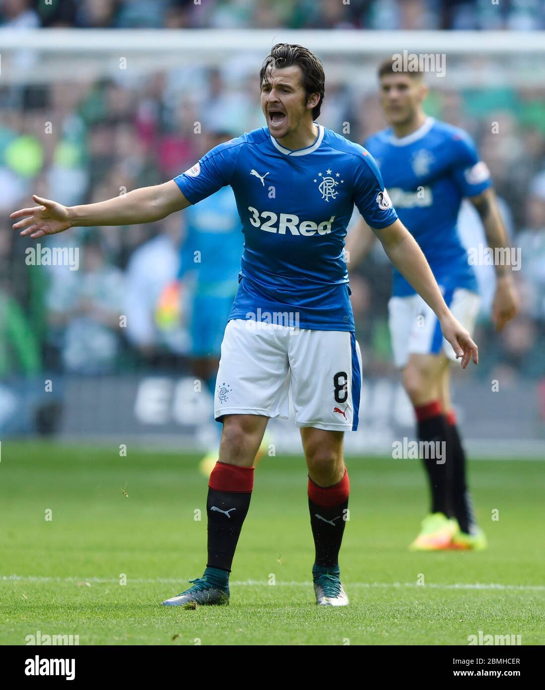 10th September 2016,Celtic Park, Glasgow. Rangers Joey Barton shouts to his team mates during the Ladbrokes Scottish Premiership game against Celtic. Stock Photo