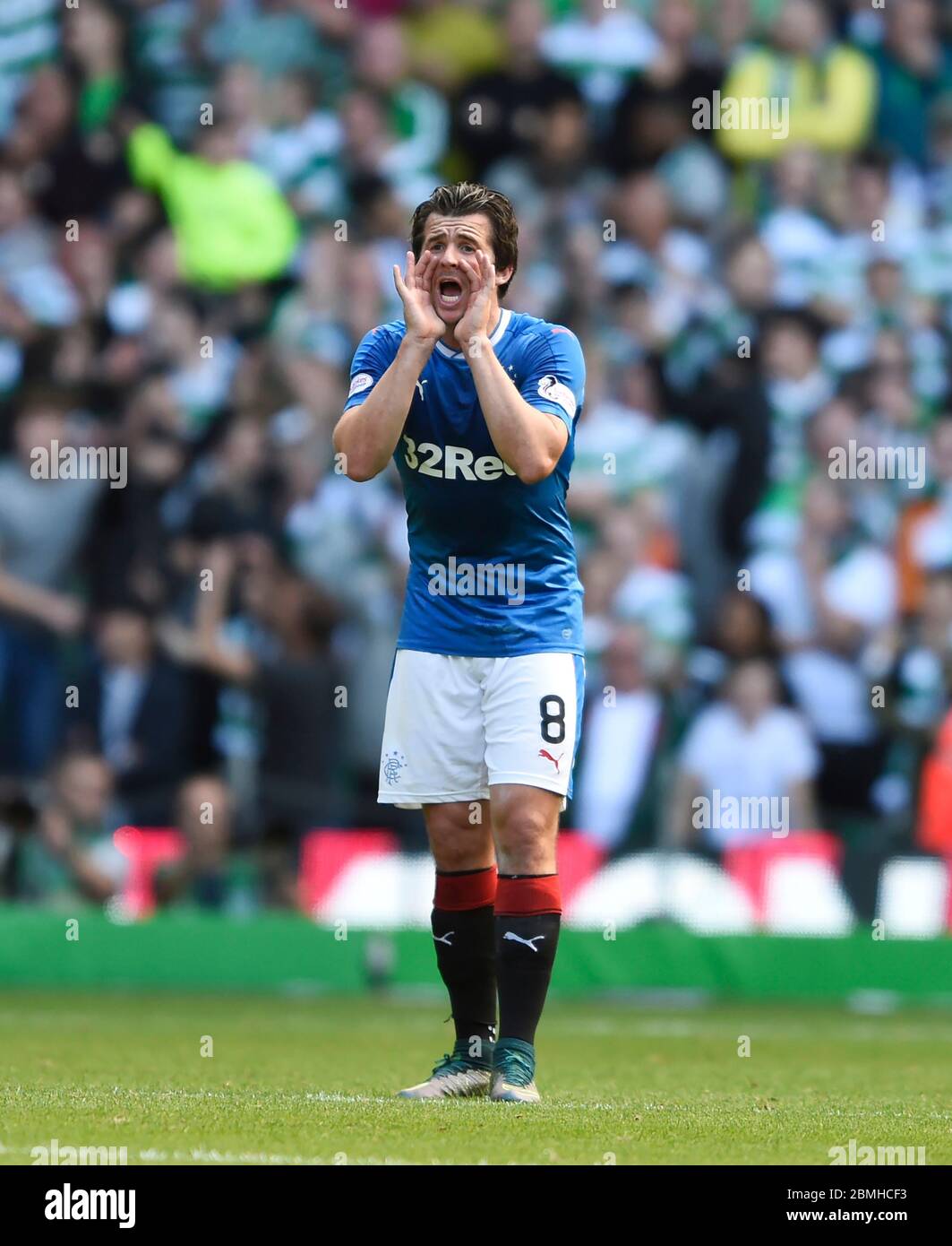 10th September 2016,Celtic Park, Glasgow. Rangers Joey Barton shouts to his team mates during the Ladbrokes Scottish Premiership game against Celtic. Stock Photo