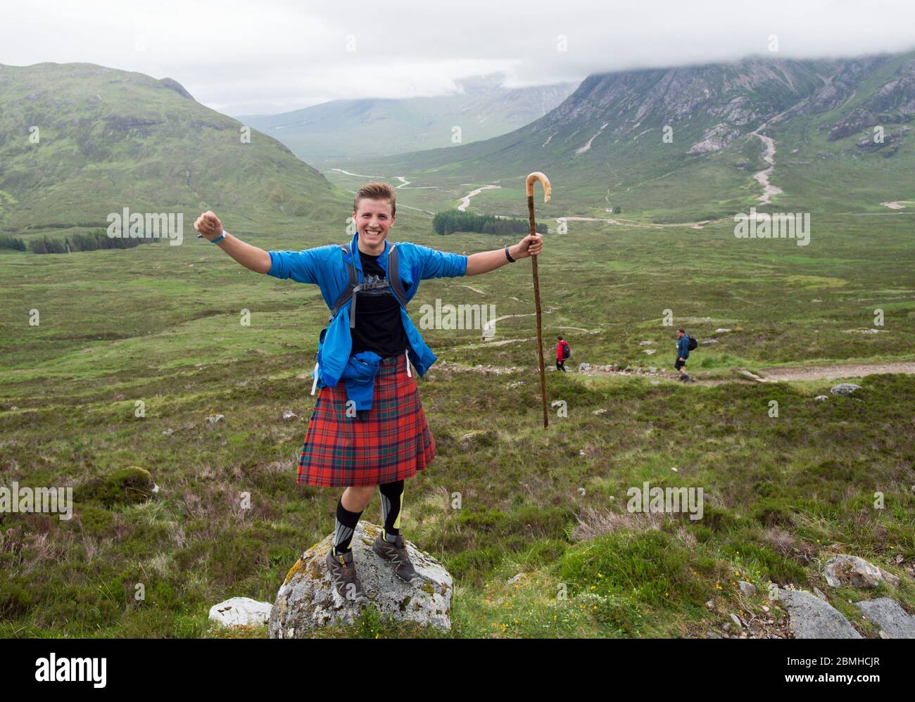 Caledonian Challenge 2016. A kilted walker on the Devils Staircase, part of the West Highland Way, Glencoe, Scotland. Stock Photo