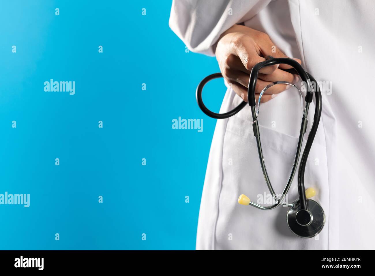 Closeup view of a hospital apron with a stethoscope in his hand Stock Photo Alamy