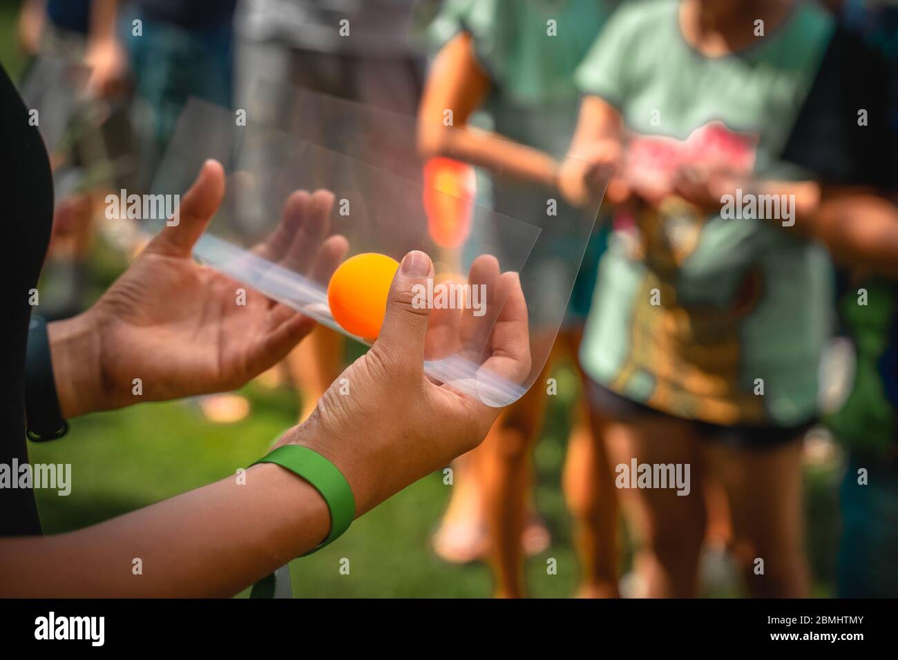 Excellent at accommodating imagery related to ping pong balls, summer games, competitive and group games for kids, creative ideas for free time activi Stock Photo