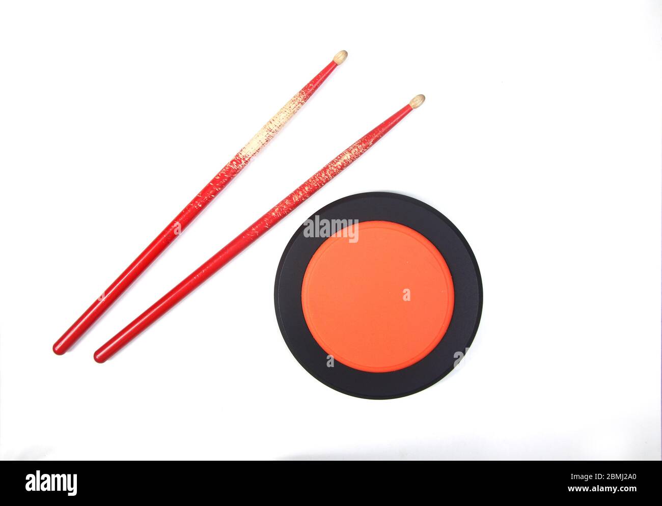 drumsticks and drum practice pad isolated on white background flat lay