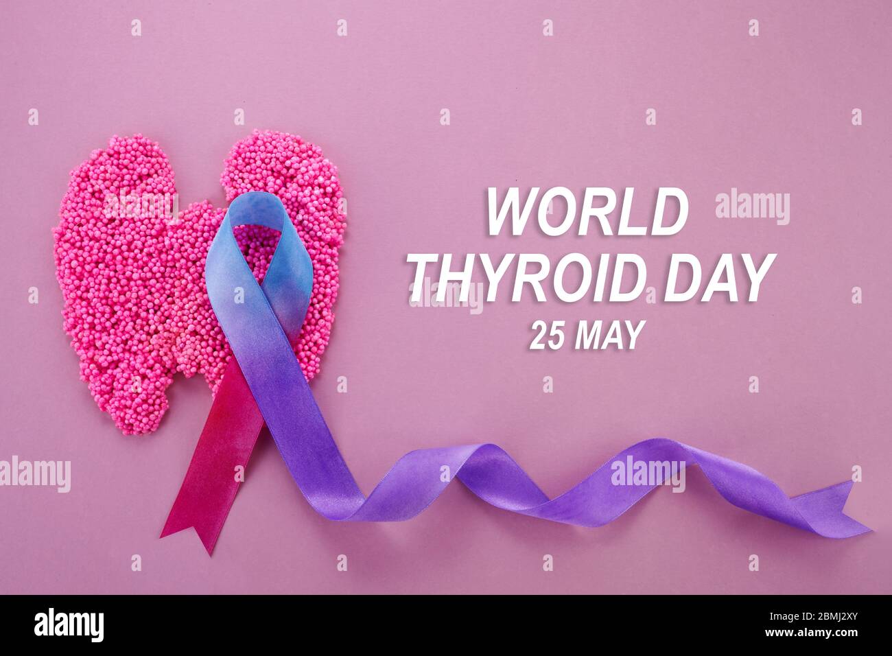 World Thyroid day background. Teal, pink and blue ribbon Stock Photo