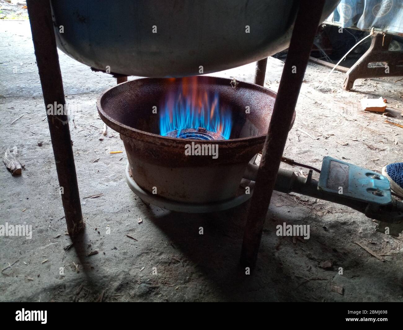 Work gas burner. Gas burner under the smokehouse tank Stock Photo Alamy