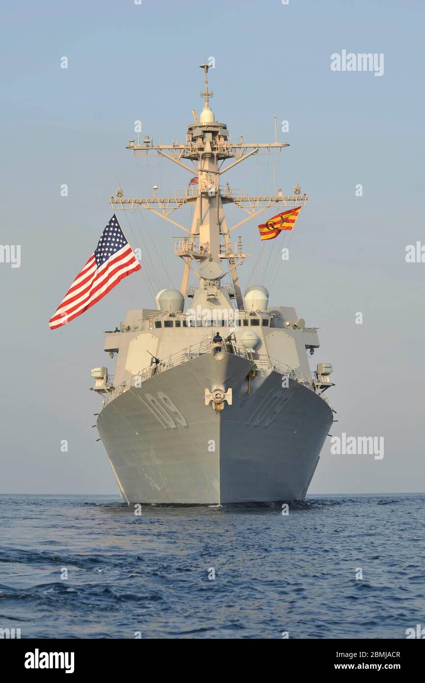 The U.S. Navy Arleigh Burke-Class guided-missile destroyer USS Jason Dunham underway in support of  Operation Enduring Freedom October 25, 2012 in the Arabian Sea. Stock Photo