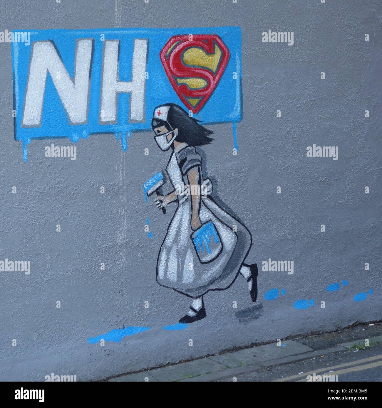 An NHS superhero mural painted on a wall in Pontefract, West Yorkshire, by local artist Rachel List. Stock Photo