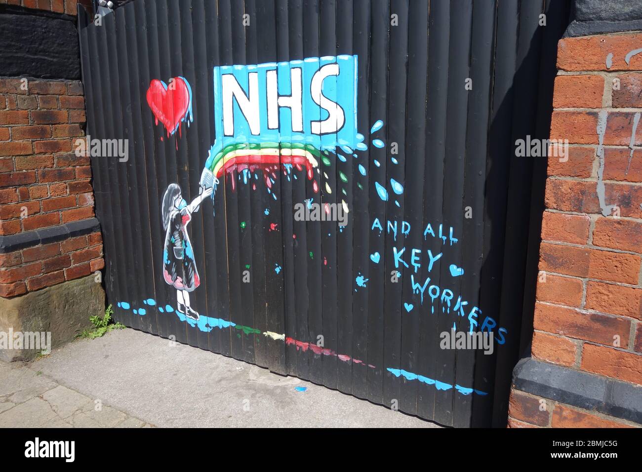 An NHS superhero mural painted on a wall in Pontefract, West Yorkshire, by local artist Rachel List. Stock Photo