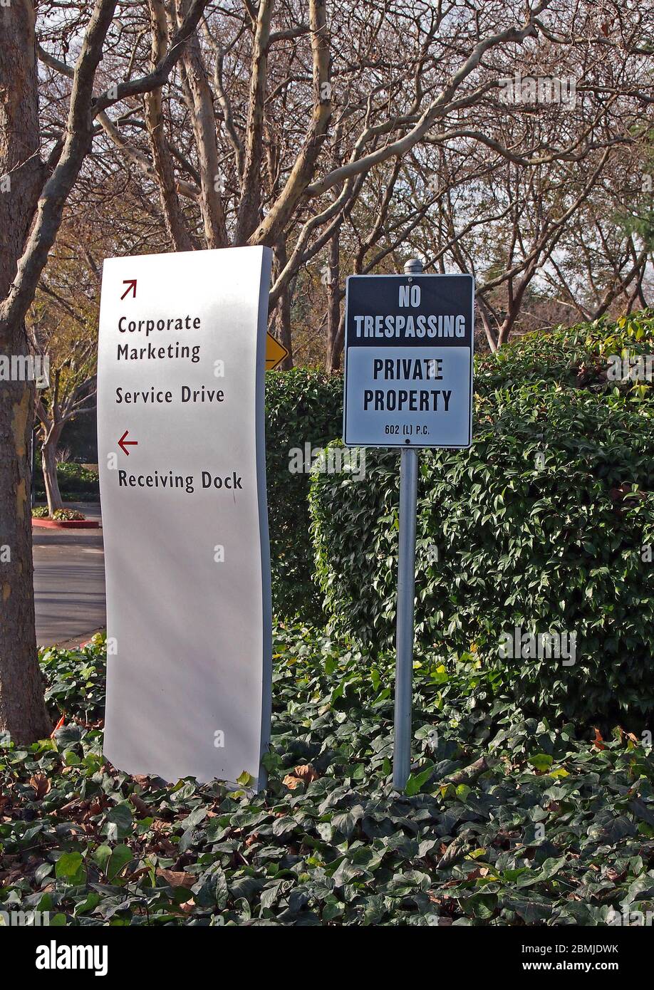 private property and no trespassing sign and directions sign in California Stock Photo