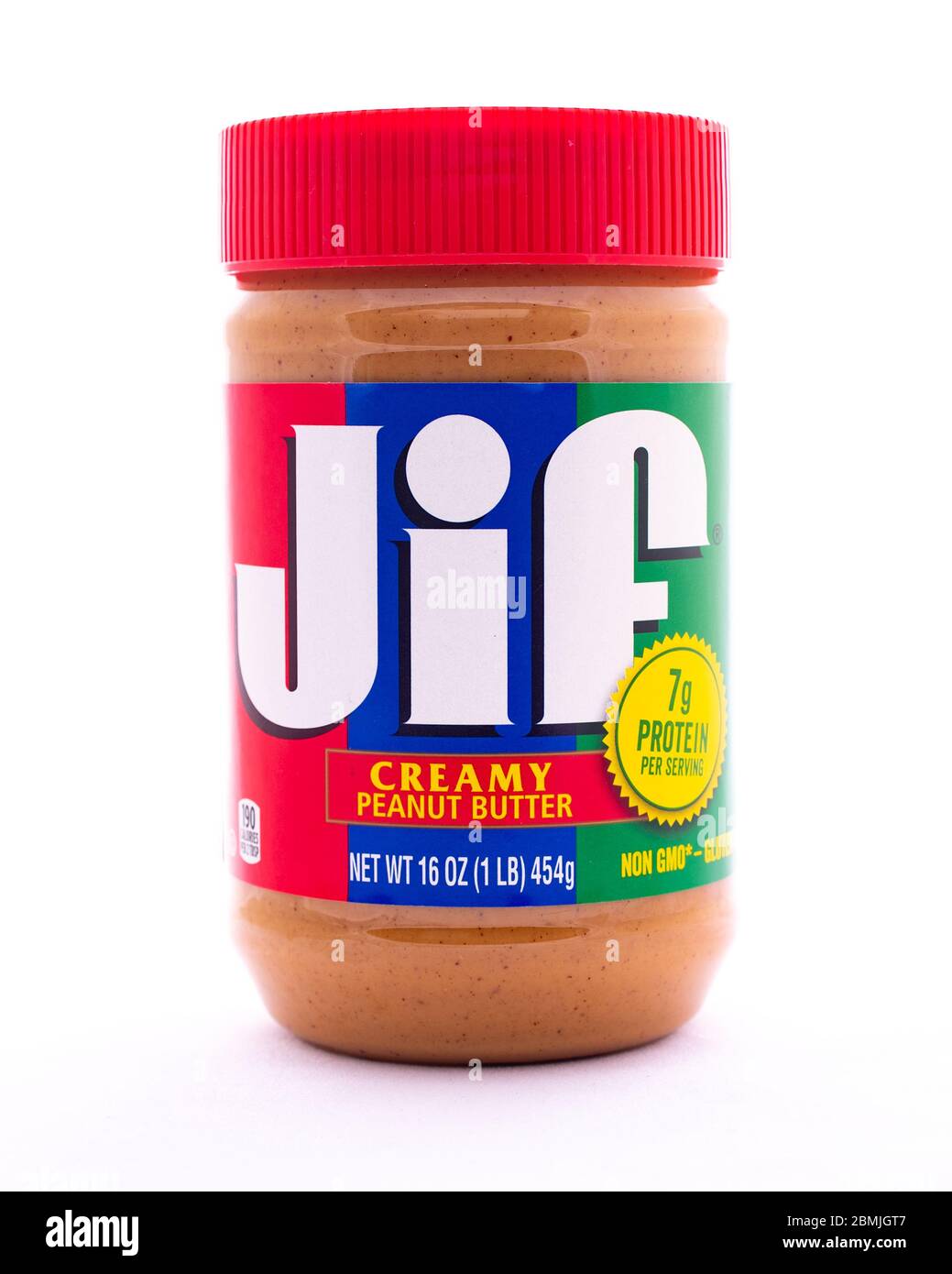 A 16 oz. jar of Jif Creamy Peanut Butter, a staple source of protein and a favorite food. Stock Photo