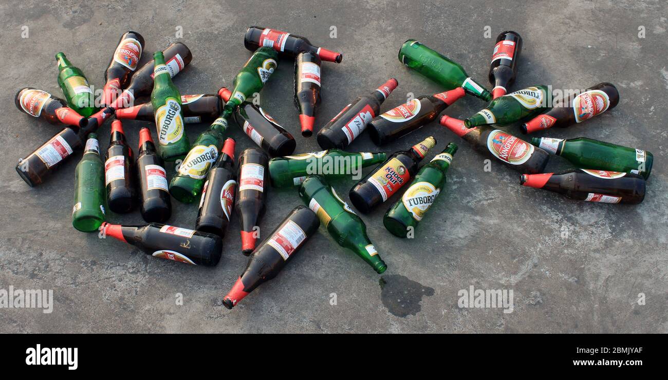 Kolkata, West Bengal on 24th March in 2016 : Empty beer bottle on the floor. Huge demand of beer during lock down for covid19 virus. Stock Photo