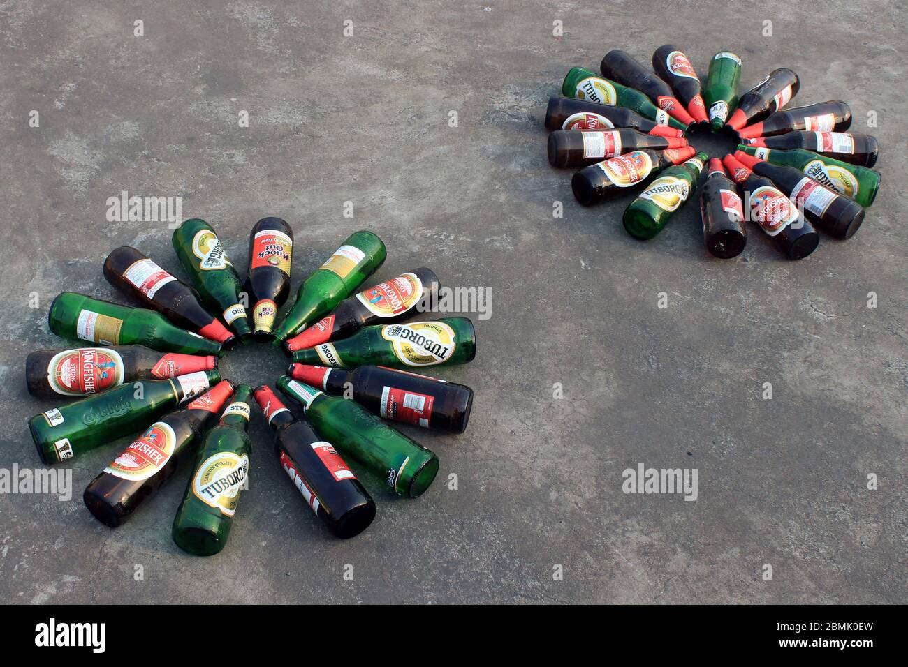 Kolkata, West Bengal on 24th March in 2016 : Empty beer bottle on the floor. Huge demand of beer during lock down for covid19 virus. Stock Photo
