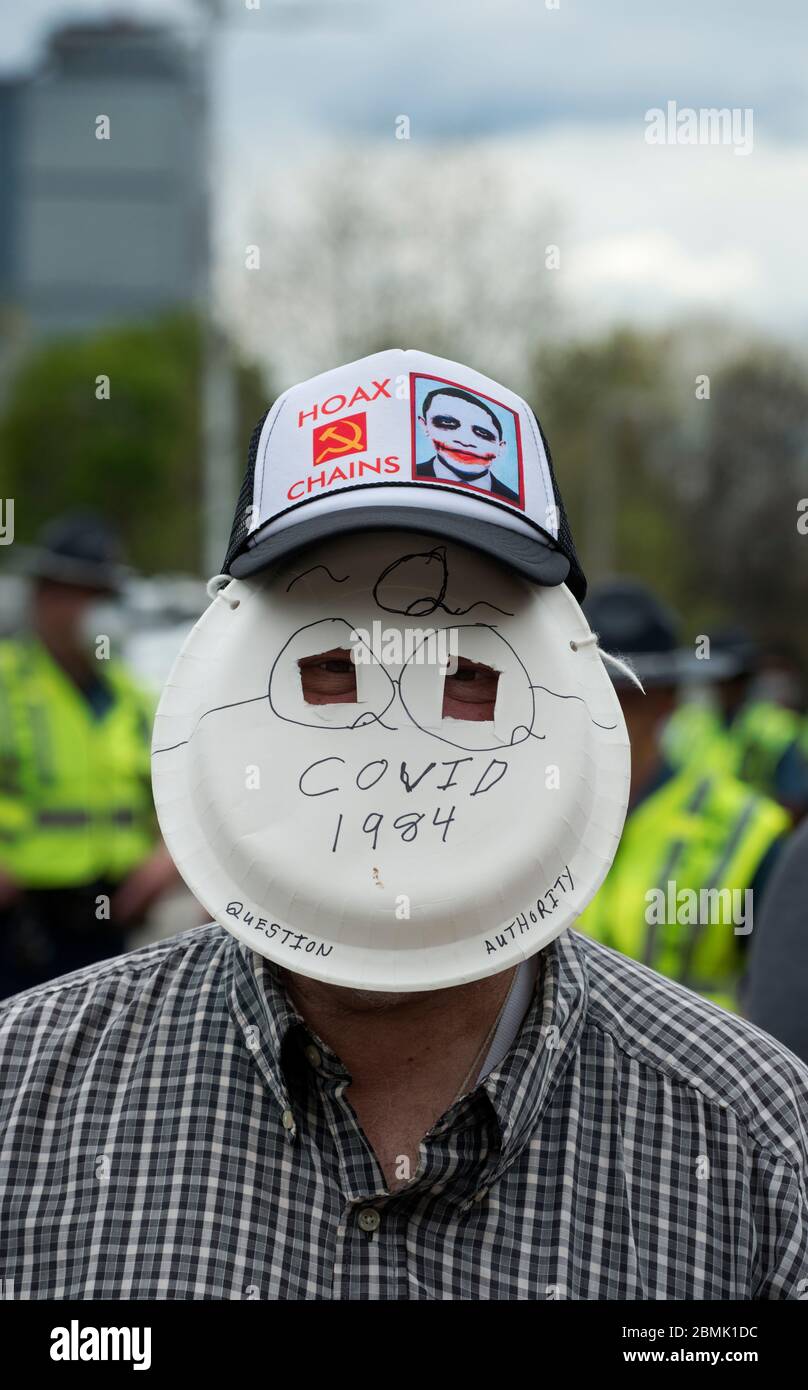 Covid-19/ Coronavirus.  Open Massachusetts ‘Liberty Rally’ at the Massachusetts State House, Boston, MA, USA. Man in homemade face mask.  04 May 2020. Stock Photo