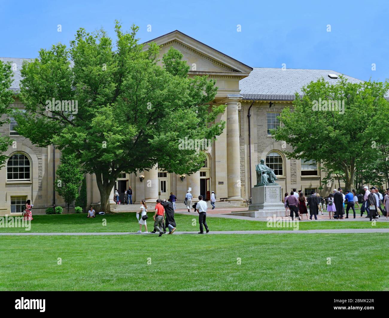 ITHACA, NY - MAY 2019:  A graduating students and their families attending commencement at Cornell University. Stock Photo