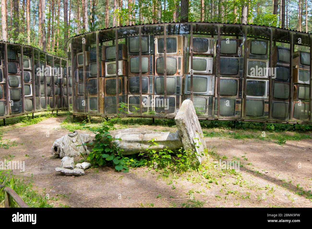 The famous sculpture by Gintaras Karosas, made of hundreds of old, Soviet era TV sets. In the foreground is a topple, marble statue of Lenin. At Europ Stock Photo