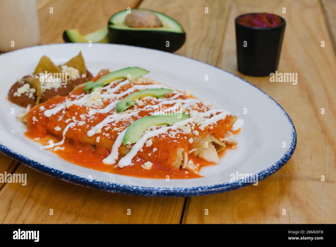 red enchiladas mexican food with tomato sauce and cheese in mexico Stock Photo