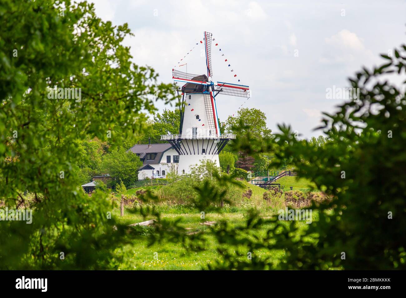 Windmill De Vlinder along estate Heerlijkheid Marienwaerdt in he Betuwe near Beesd, Gelderland The Netherlands Stock Photo
