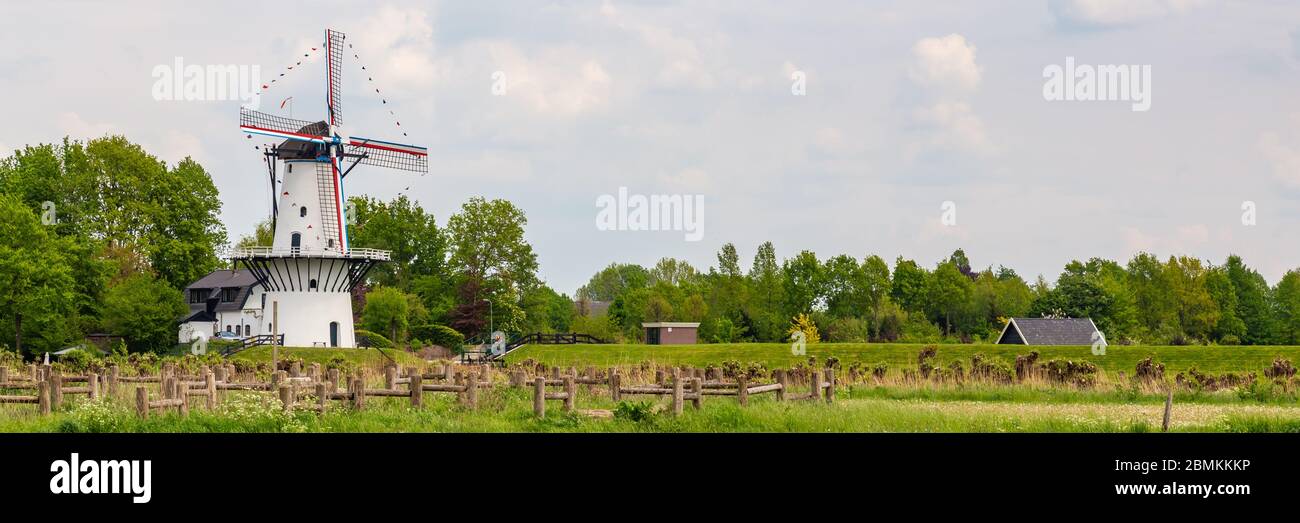 Windmill De Vlinder along estate Heerlijkheid Marienwaerdt in he Betuwe near Beesd, Gelderland The Netherlands Stock Photo