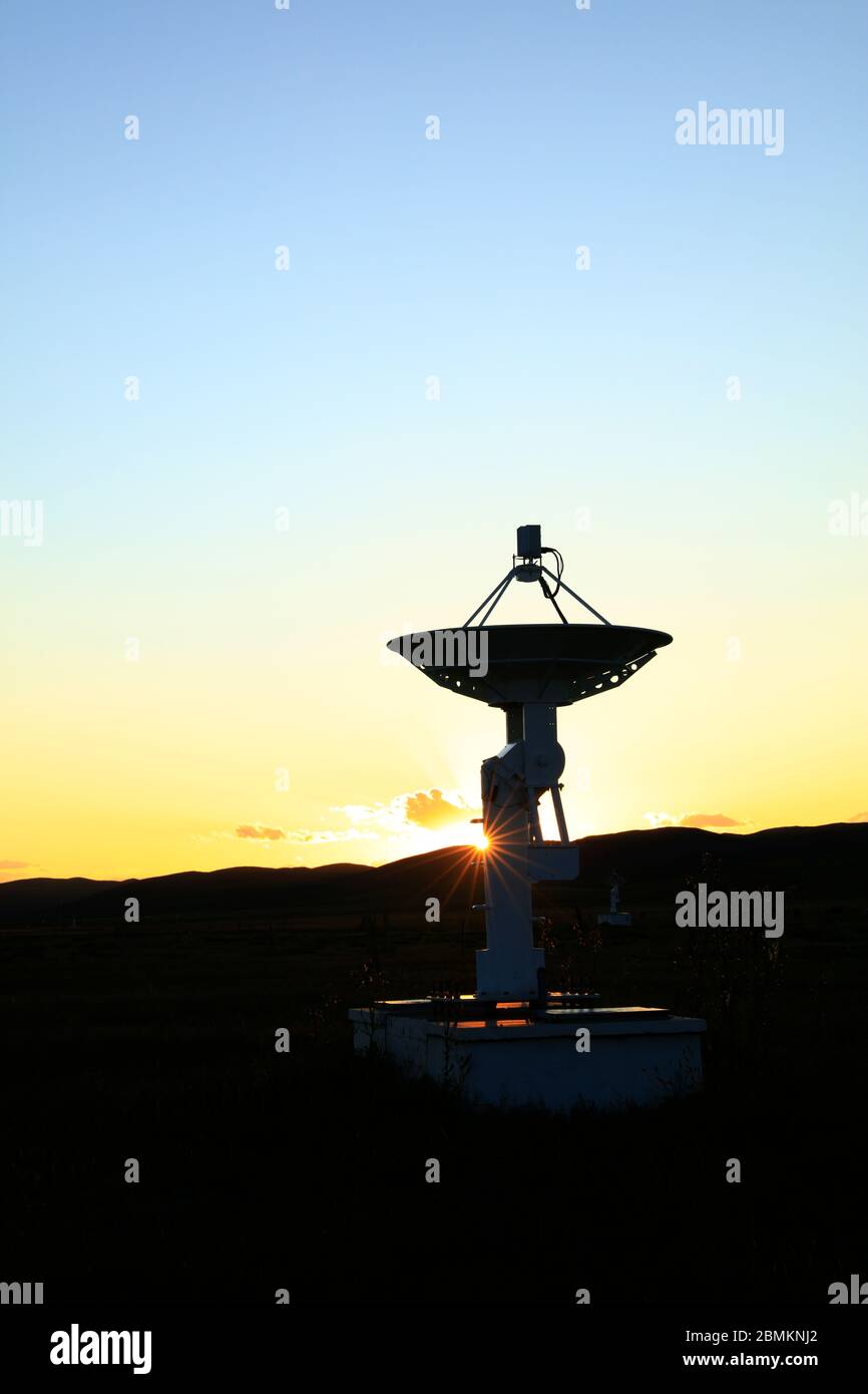 The observatory in the evening,The silhouette of a radio telescope Stock Photo