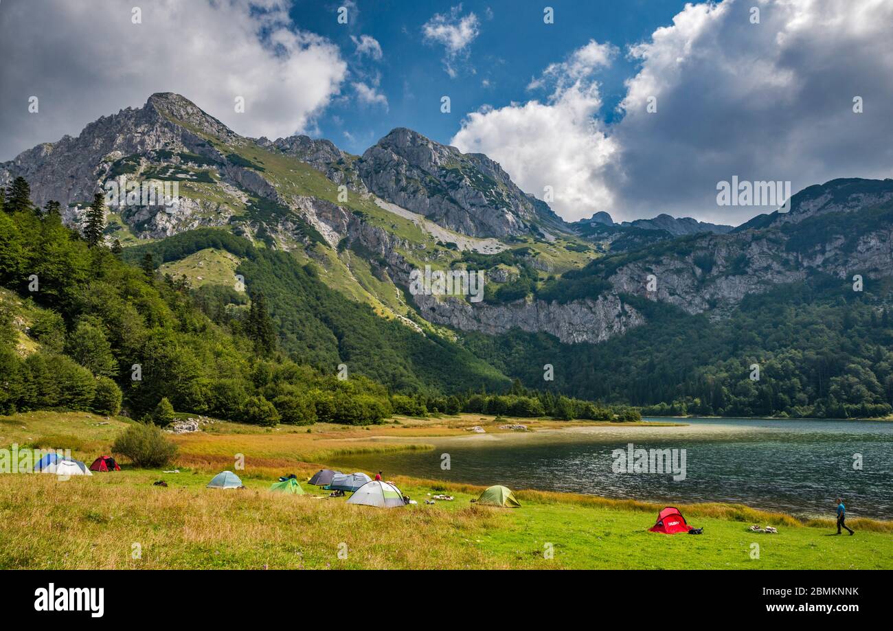Tents at Trnovacko Lake, Maglic massif, near Sutjeska National Park, Dinaric Alps, Montenegro, Southeastern Europe Stock Photo