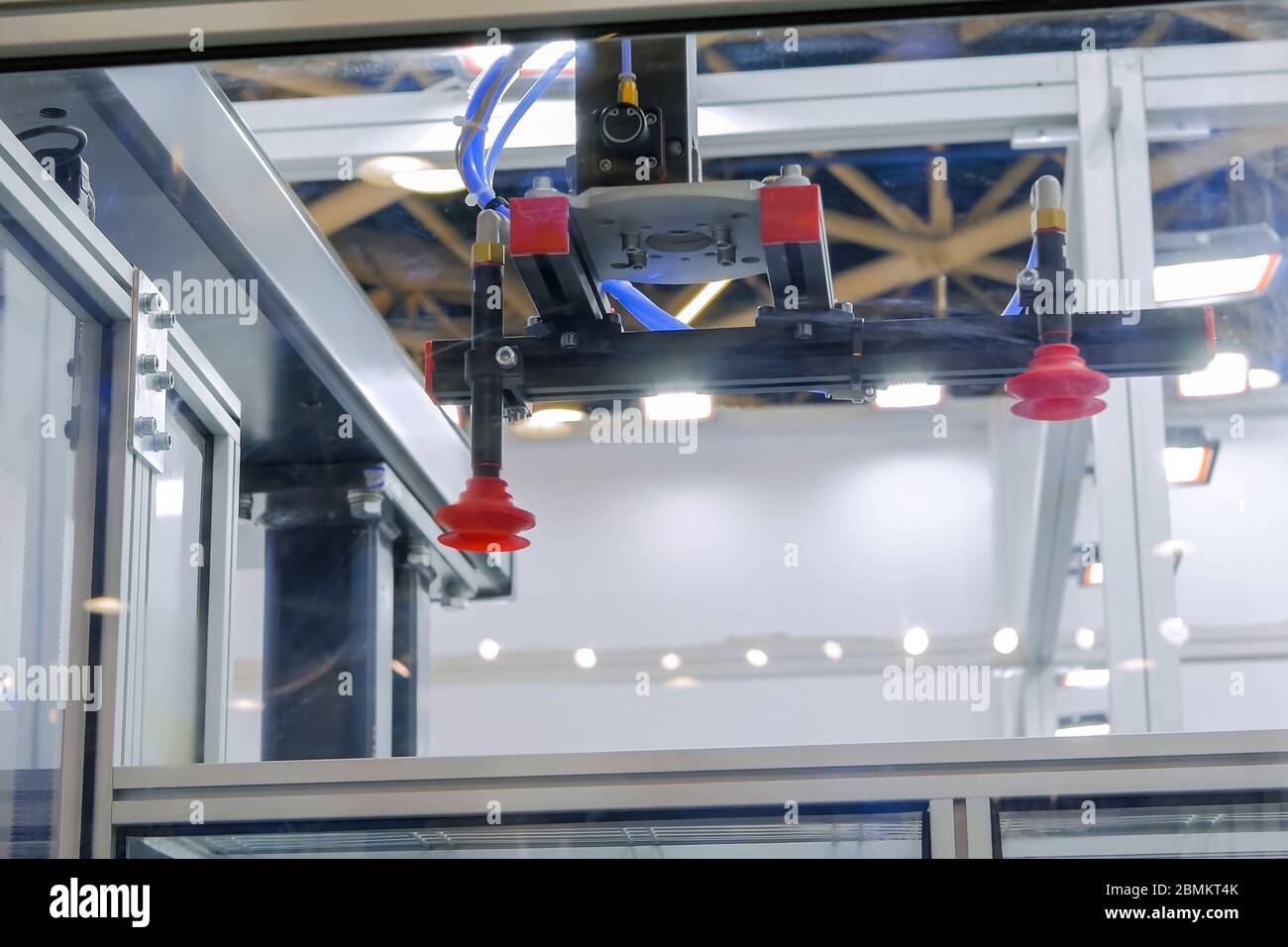 Close up view of automatic pick and place robotic arm manipulator with