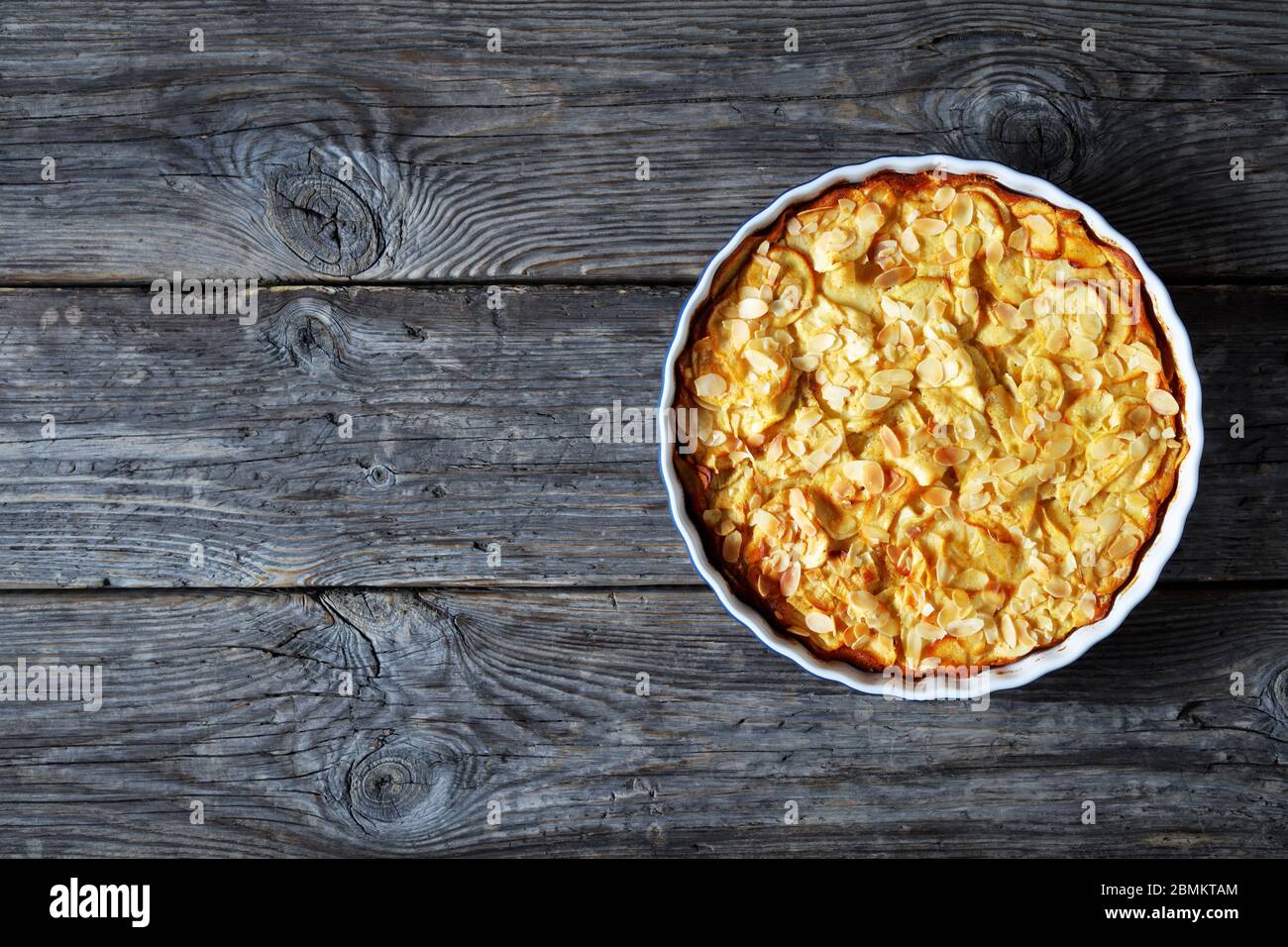 Gateau Invisible Invisible Apple Cake In A Round Baking Dish On An Old Rustic Grey Wooden Table French Cuisine Flat Lay Free Space Stock Photo Alamy