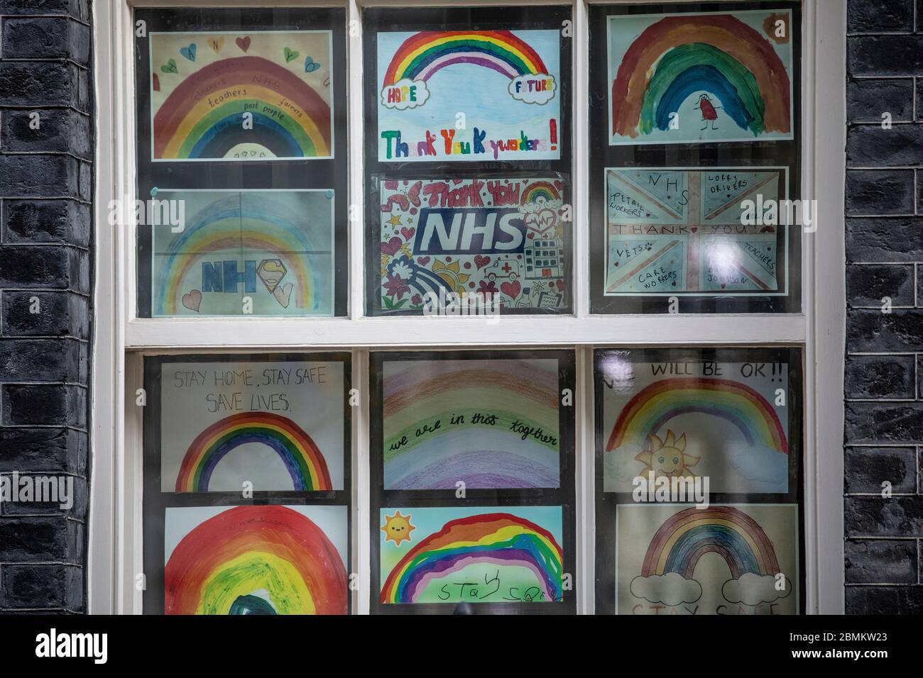 Rainbow paintings on the window's of No.10 Downing Street to show gratitude to NHS and Care Workers on the frontline in hospitals fighting coronavirus Stock Photo