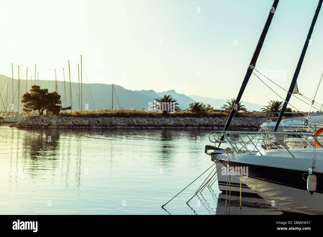 Sailboats Anchored In A Row In A Small Port In Split Croatia Clear Beautiful Sea During Early Morning Sunrise Stock Photo Alamy