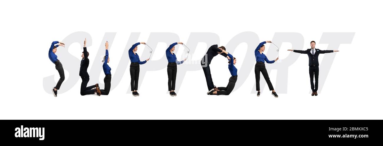 Group of people forming support word at studio Stock Photo - Alamy
