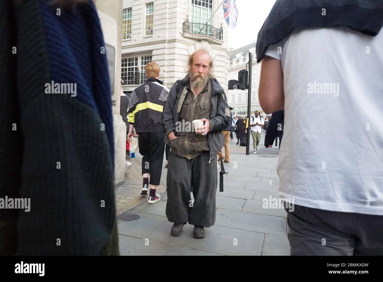 Homeless beggar in Oxford Street Central London Stock Photo