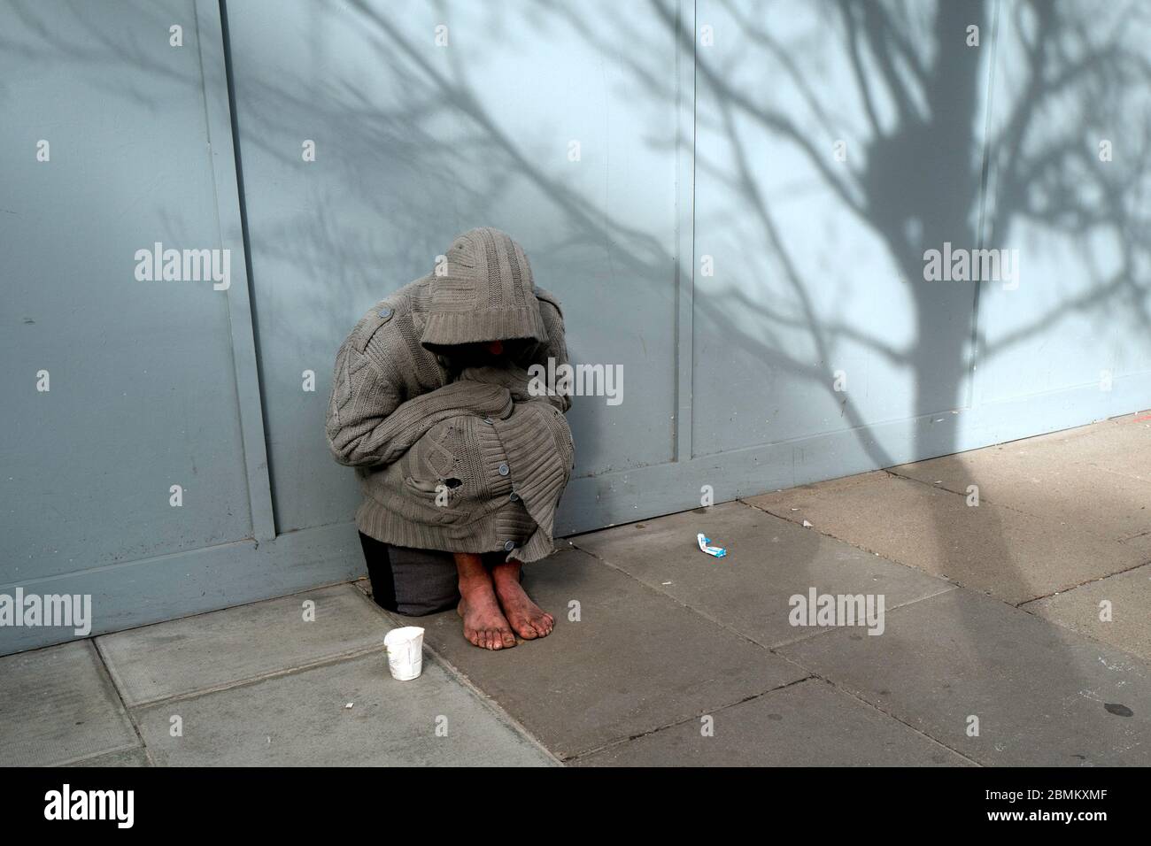 Homeless beggar in Oxford Street Central London Stock Photo