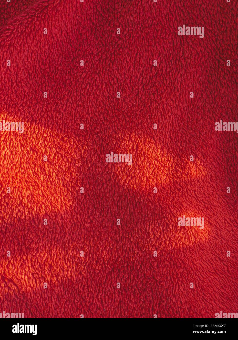 Red blanket texture on the sunlight Stock Photo Alamy