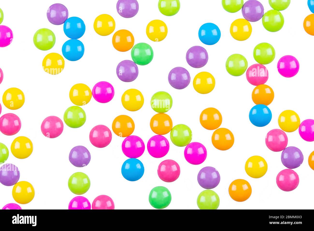 Colorful chocolate coated candy isolated on white background with ...