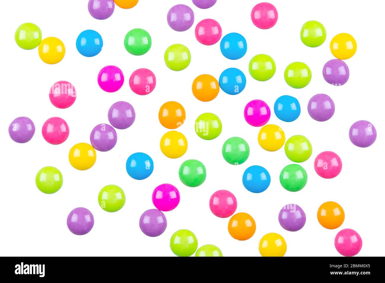 Colorful chocolate coated candy isolated on white background with ...