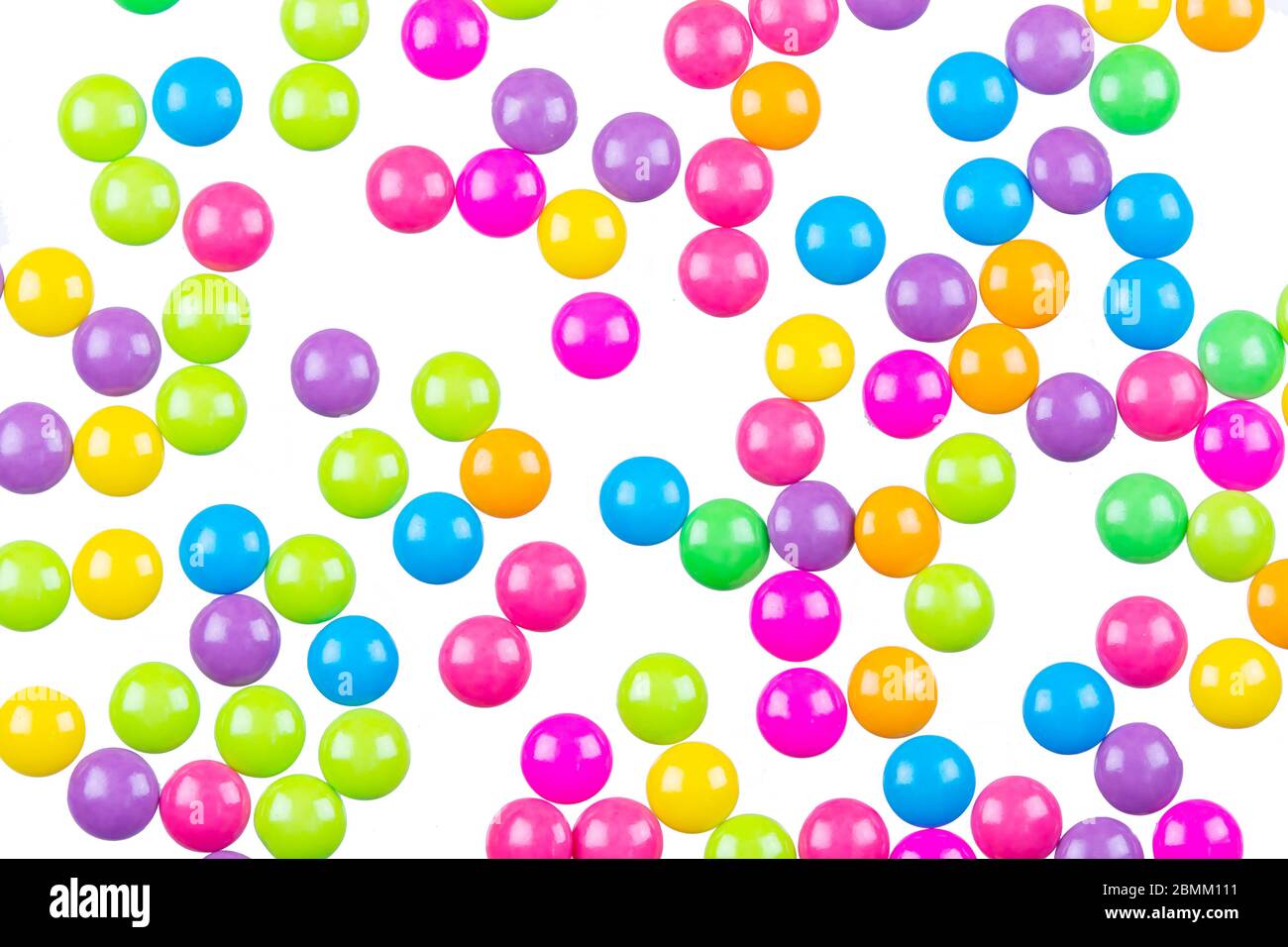 Colorful chocolate coated candy isolated on white background with ...