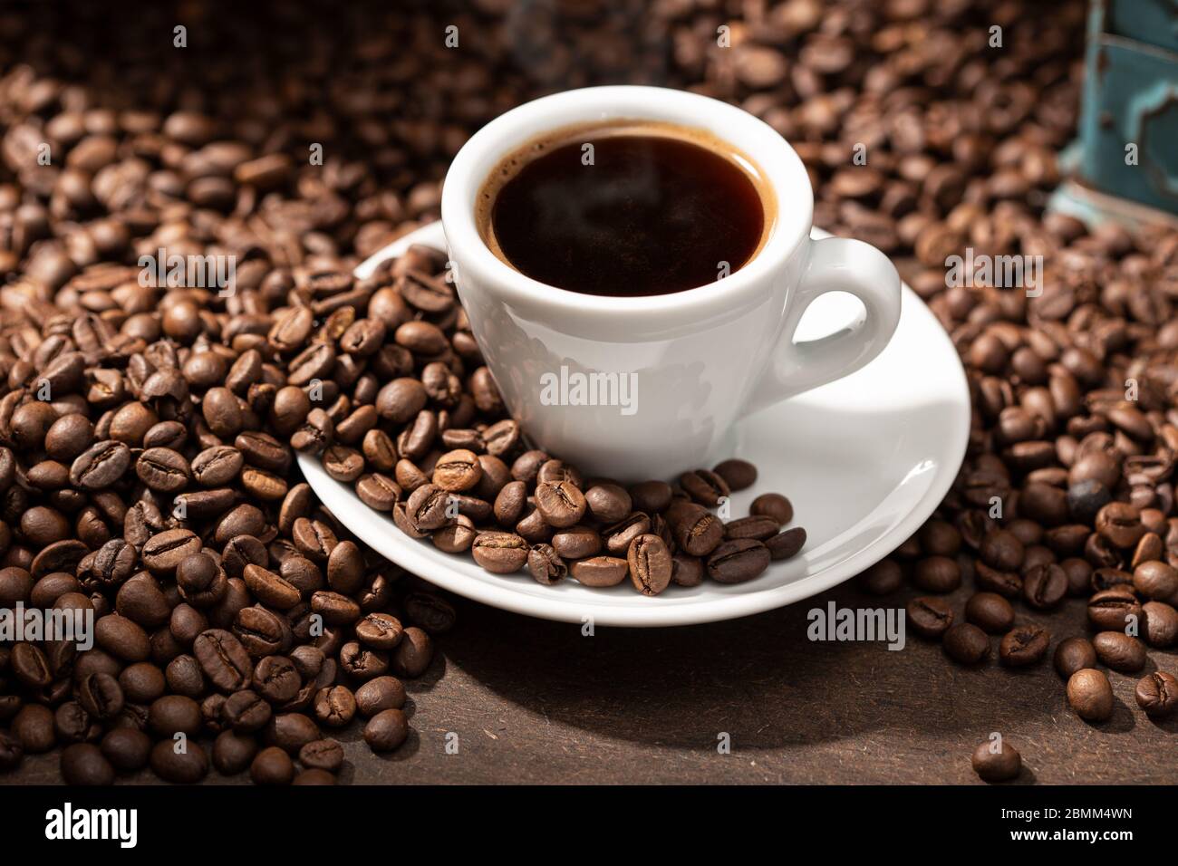 Espresso Coffee cup and roasted beans. Coffee background Stock Photo