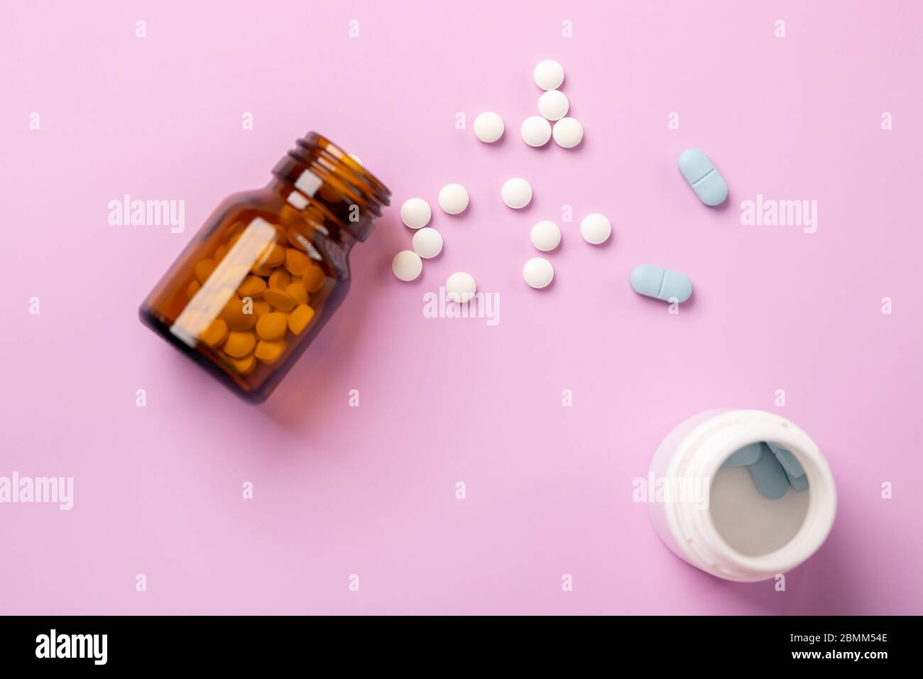 Different medications. Various pill bottles. Onecolor backdrop Stock Photo Alamy