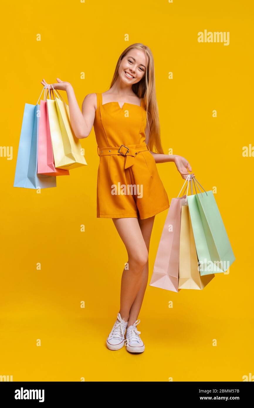 Big Sales. Portrait Of Happy Girl With Lots Of Shopping Bags Stock Photo -  Alamy