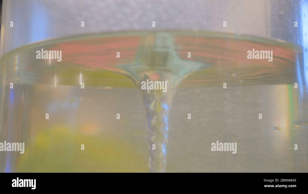 Spinning water whirlpool demonstrates hydro power at technology exhibit