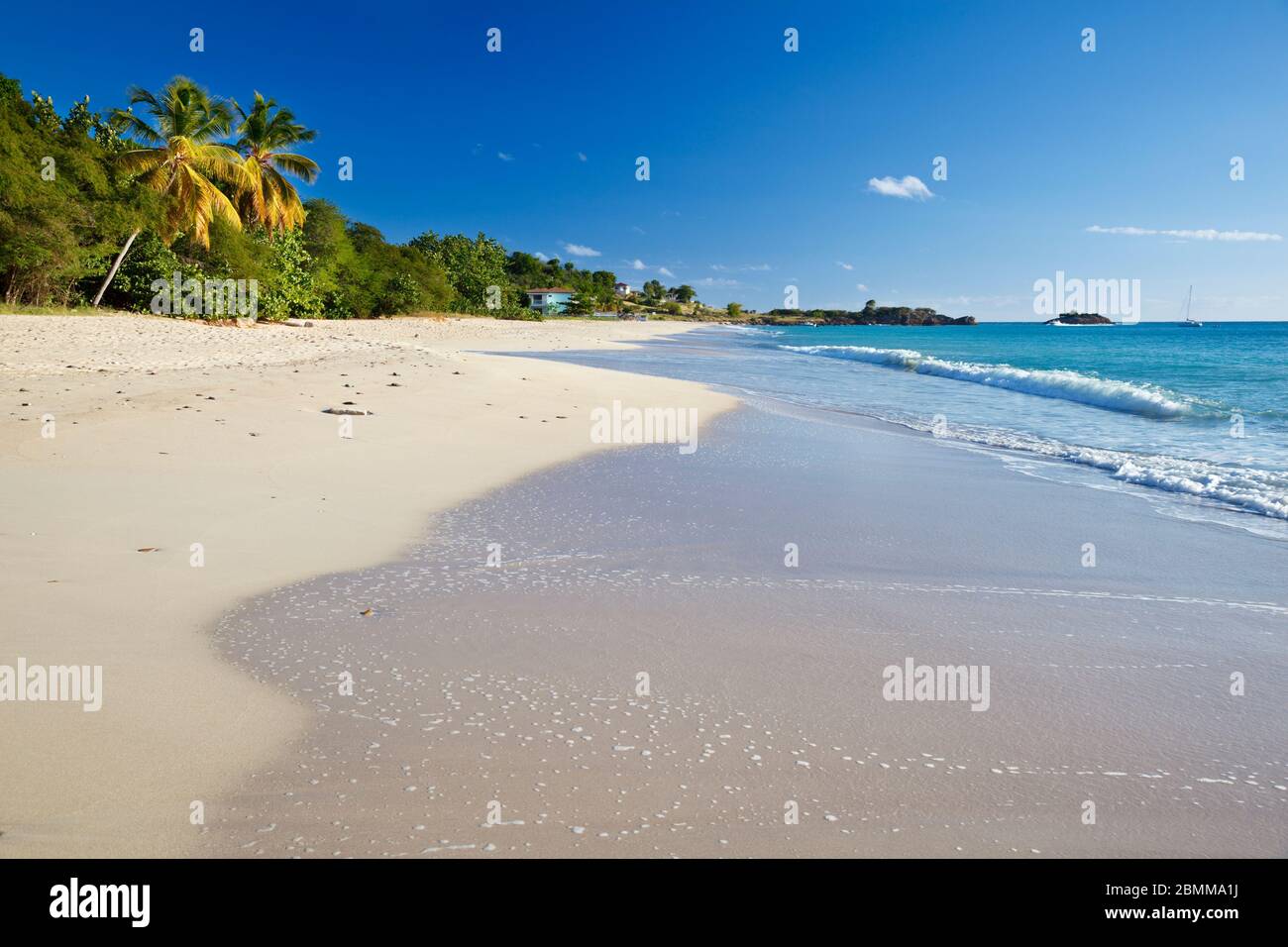 Turners Beach in Antigua with deep blue sky and turquoise water Stock