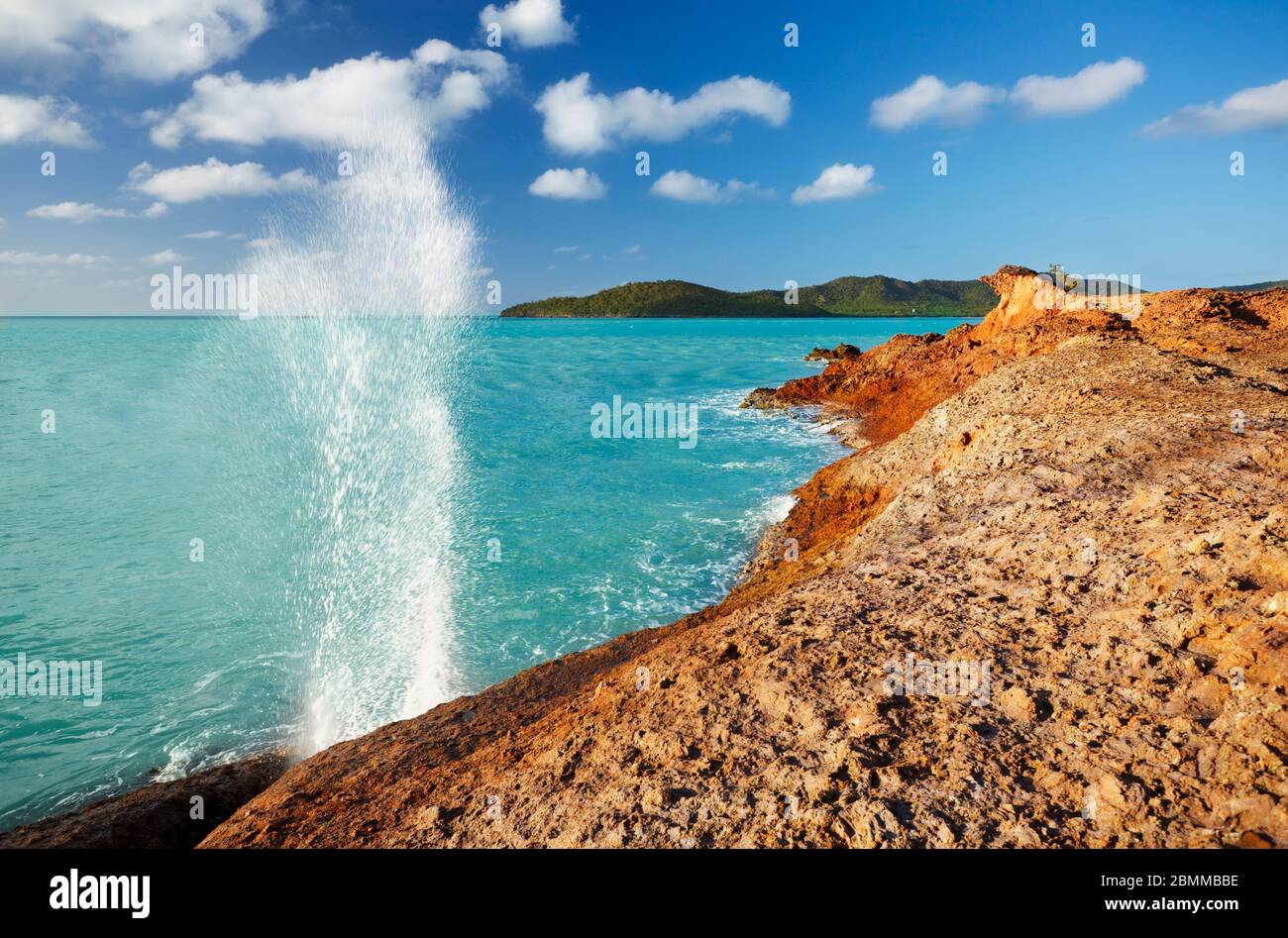 A blow hole produced by waves running into a crevice at Stony Horn, Antigua. Stock Photo
