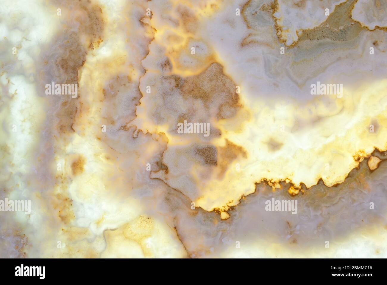 Futuristic stains and bright light on marble surface Stock Photo