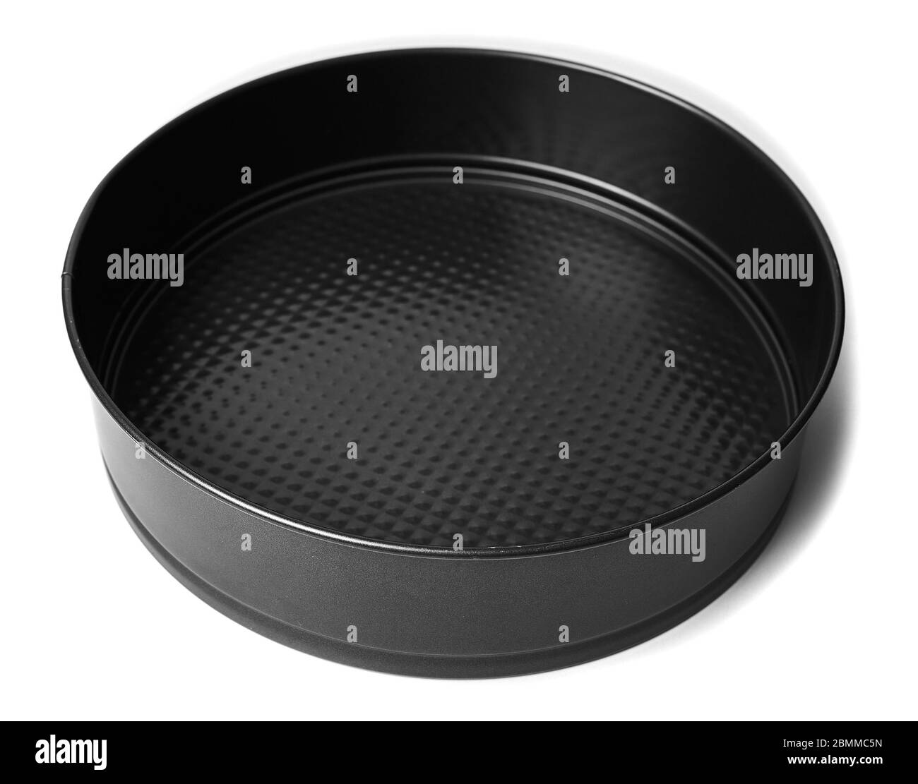 Round metal baking dish, isolated. Baking form with removable bumpers Stock Photo Alamy