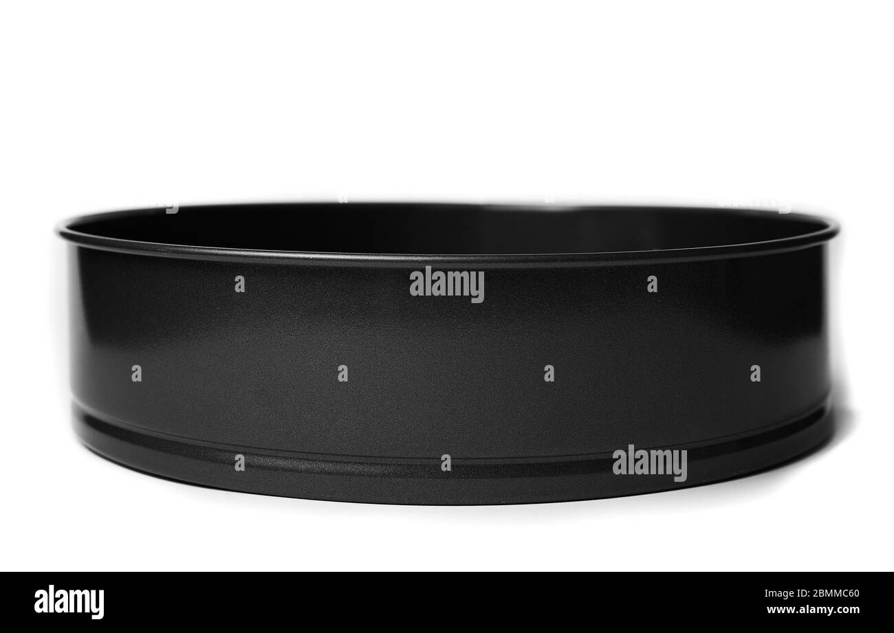 Round metal baking dish, isolated. Baking form with removable bumpers Stock Photo Alamy