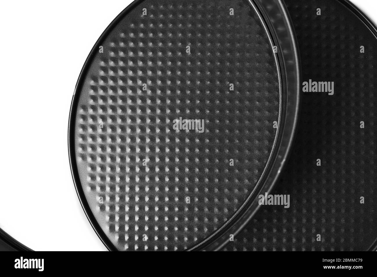 Round metal baking dish, isolated. Baking form with removable bumpers Stock Photo Alamy