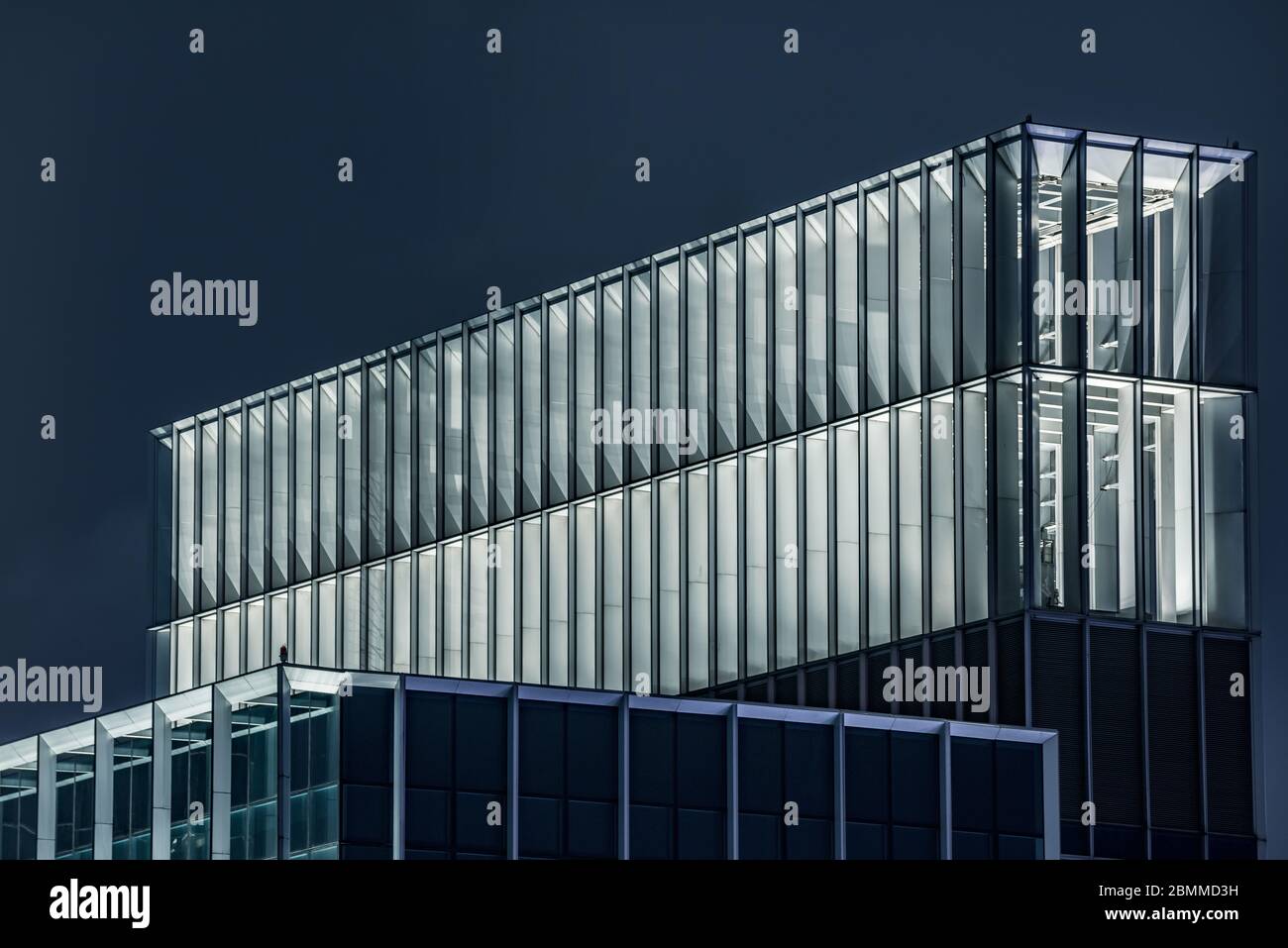 modern office building exterior at night Stock Photo - Alamy