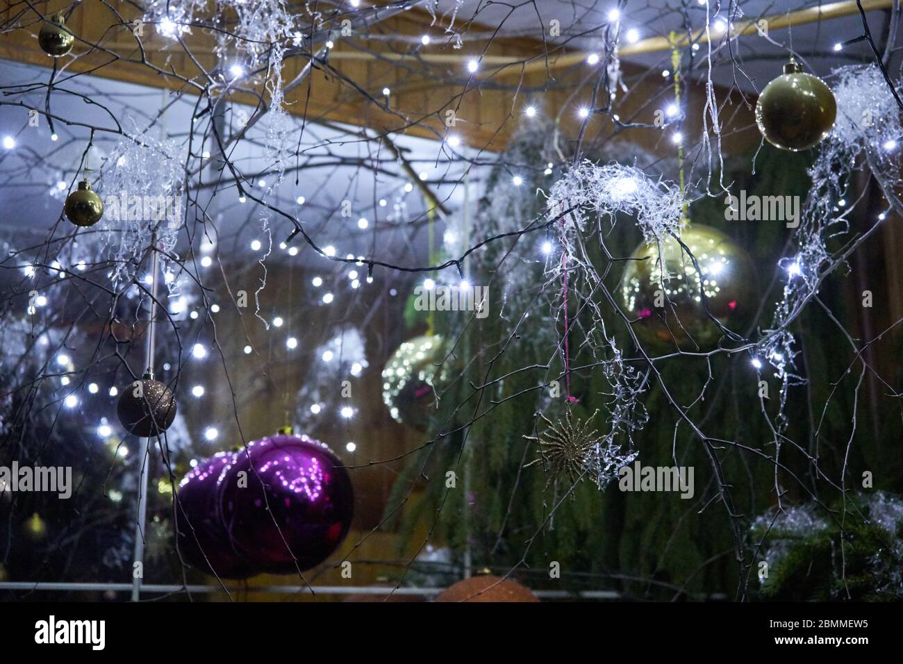 Christmas tree decorations with balls and lights Stock Photo
