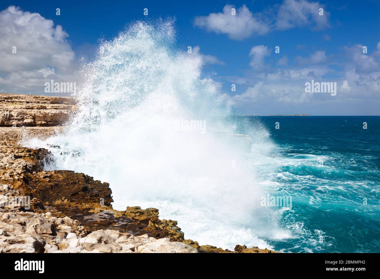 Tall atlantic waves close to Devil's Bridge. Stock Photo